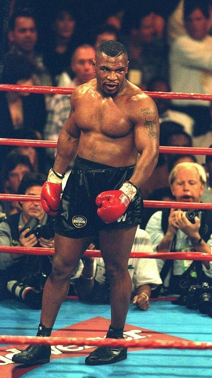 Heavyweight staring down his opponent between rounds