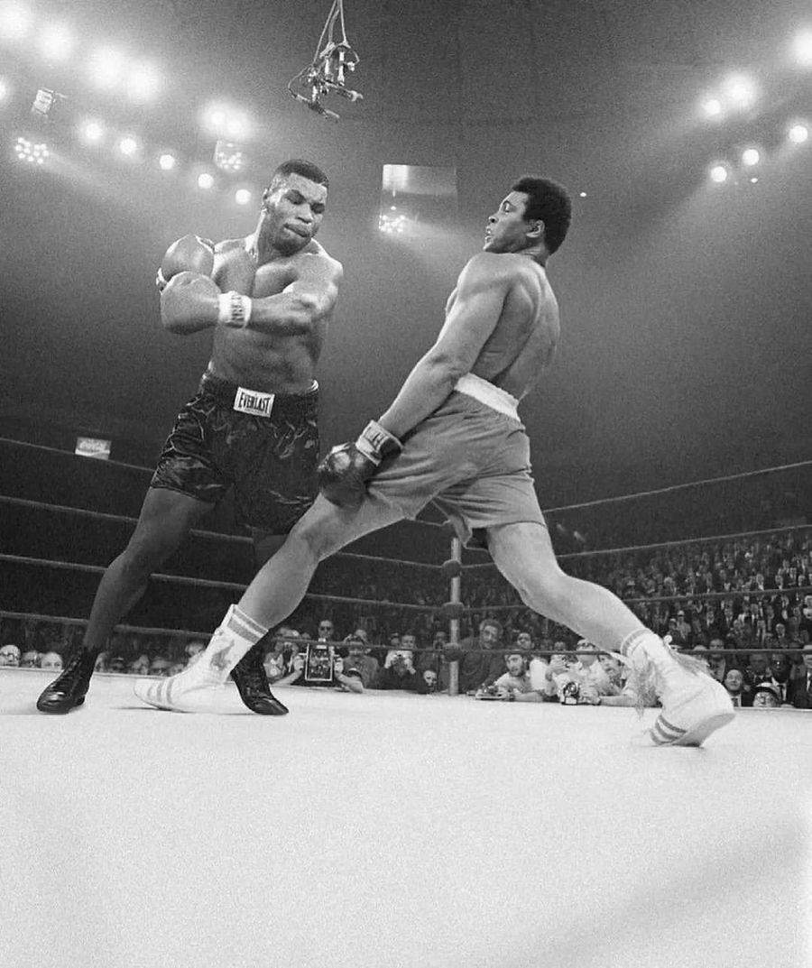 Championship bout under the arena lights, black and white