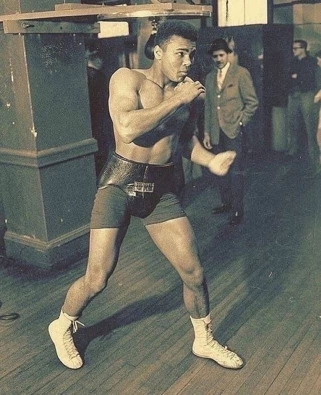 Fighter working combinations on the gym floor, 1950s